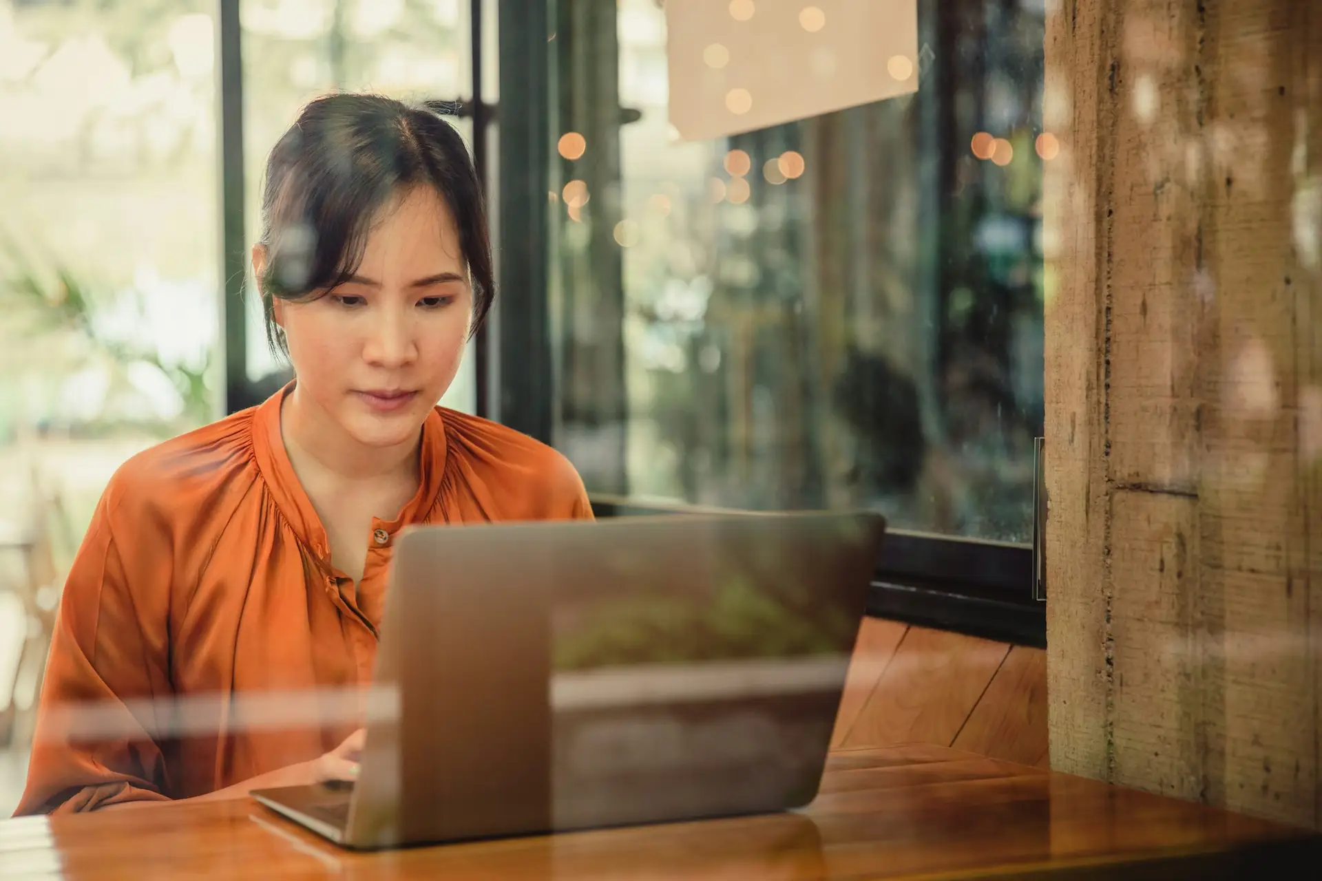 Agency professional reviewing white-label marketing solutions on a laptop.