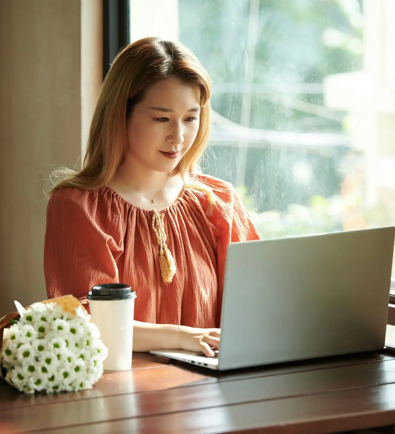 Young Woman Working on Laptop