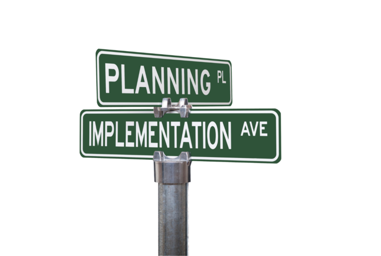 Street signs for Planning Place and Implementation Avenue, symbolizing the intersection of strategic planning and execution in SMS marketing campaigns.